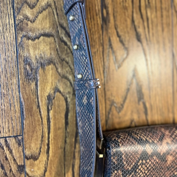 Black and brown animal print small sized crossbody purse. - Picture 4 of 11